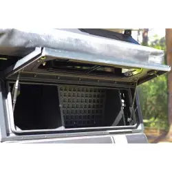 Grille 560mm d'organisation pour compartiment latéral de hardtop Alu-Cab